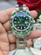 Rolex Submariner Date, 18K White Gold Diamonds Emerald UNWORN, 40mm